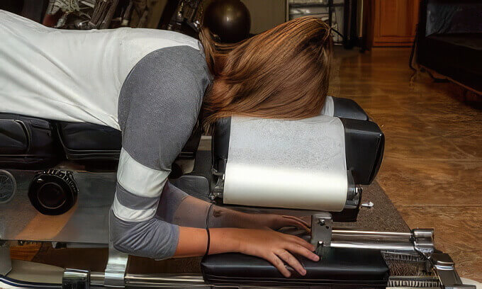 Woman laying on chiropractic table