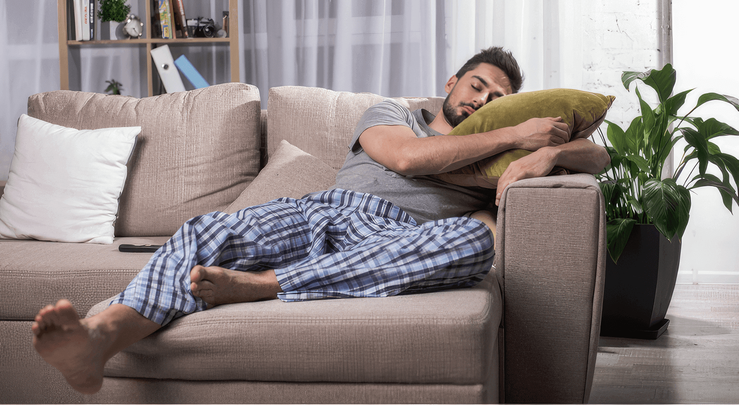 Man asleep on couch