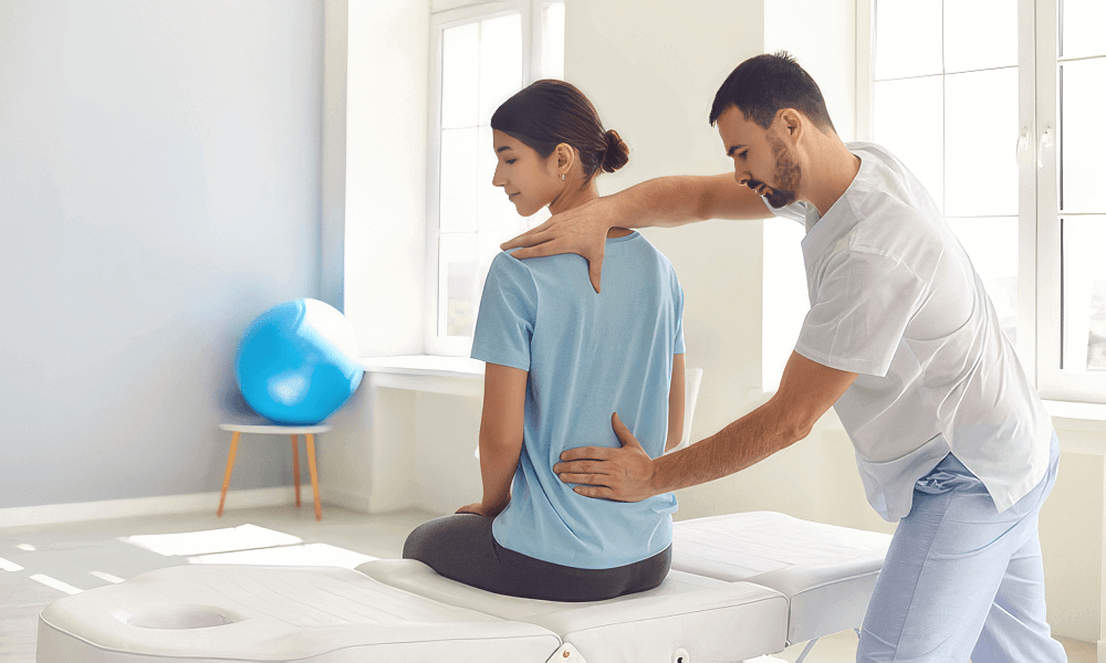 Woman receiving chiropractic treatment